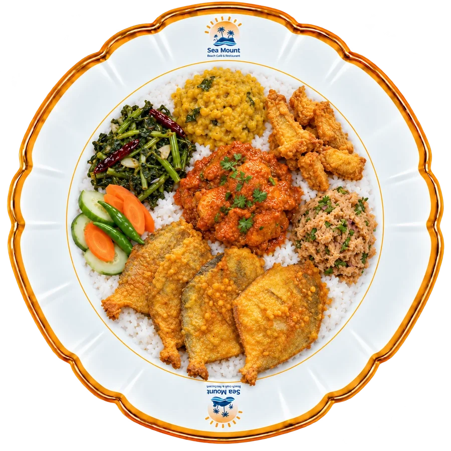 Bangla platter with fried fish, chicken, dal, greens, bhorta and rice