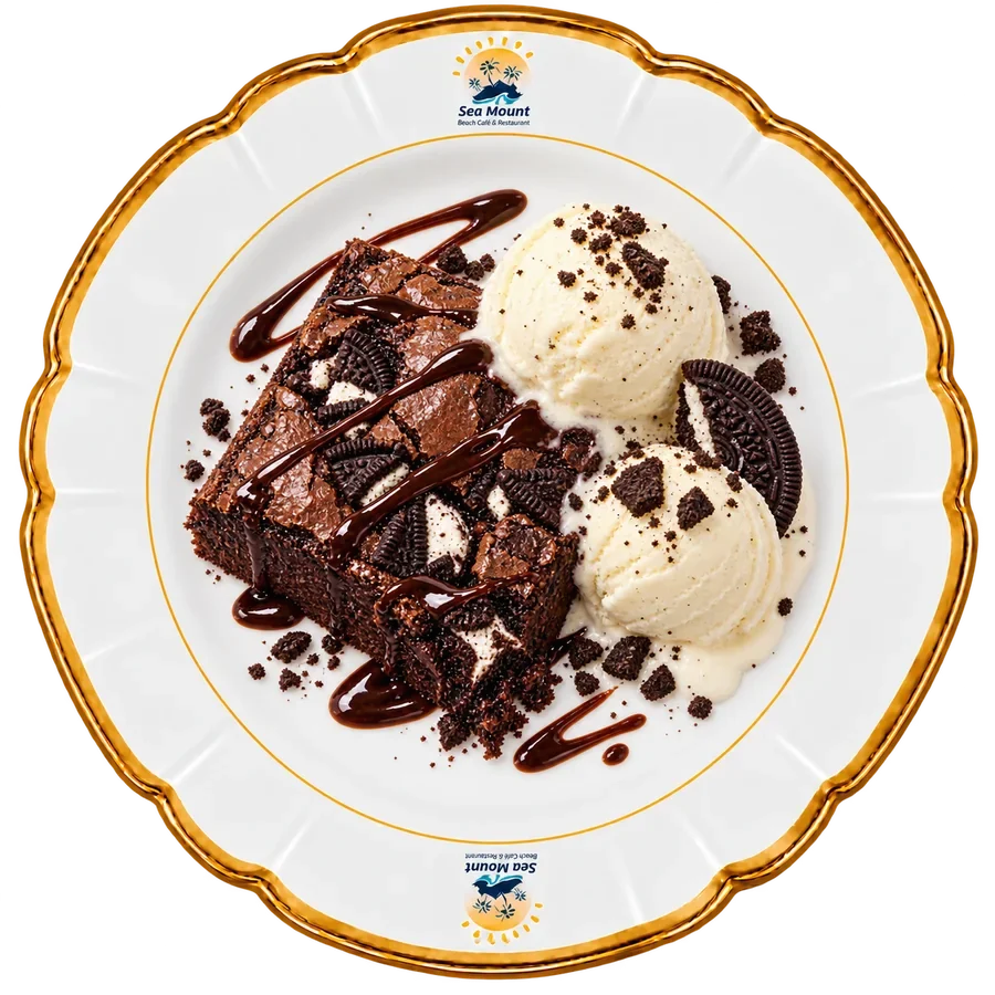 Chocolate brownie with vanilla ice cream and cookie crumbs at Sea Mount Beach Café